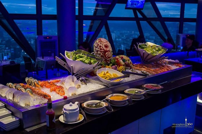 Dine-in at Orbit Revolving restaurant Kuala Lumpur(with transfer) - Where the evening starts: pickup, timing, and what you are really buying