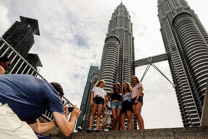 Group Tour: Half-Day Kuala Lumpur City Exploration Tour - Door-to-door pickup, small groups, and a guide who connects the dots
