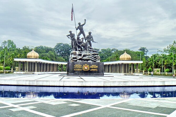 Kuala Lumpur City & Batu Caves Temple Private Tour - Masjid Negara and Merdeka Square: prayers, photos, and independence