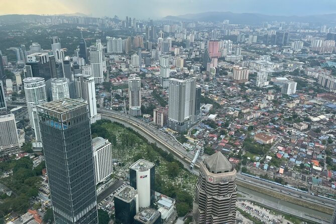 Kuala Lumpur City Tour with Petronas Twin Tower Admission Ticket - Central Market and the River of Life for Real City Rhythm