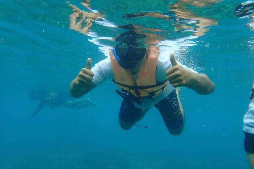 Langkawi: Dangli Island Snorkel and Swim Speedboat Tour - When crowds and sand change the water clarity