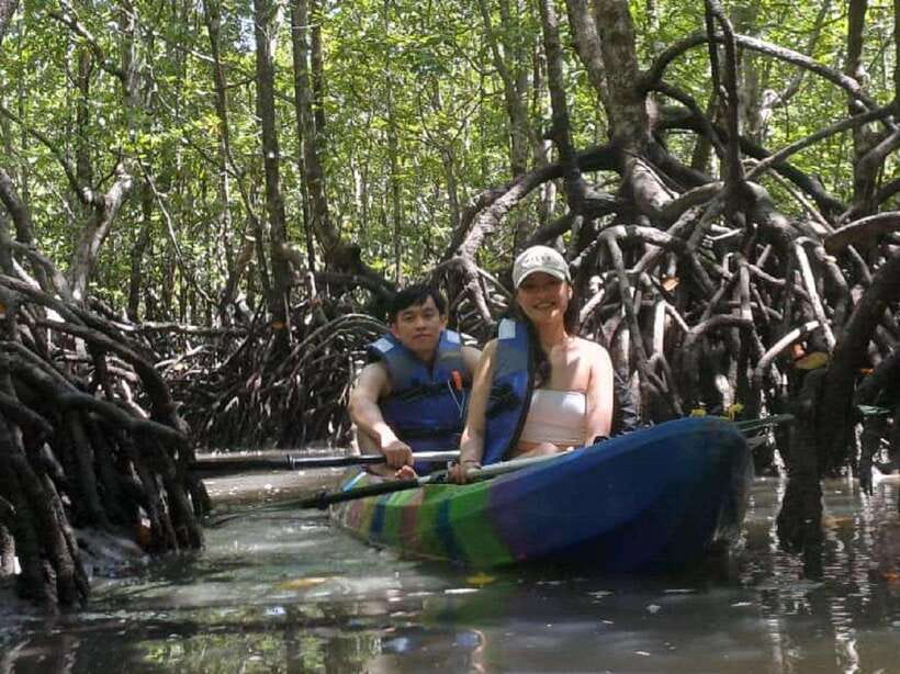Langkawi: Sunset Kayaking Tour - Sunset viewing from the kayak, with orange and pink skies