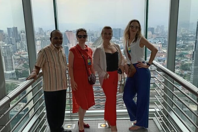 Petronas Twin Tower Skybridge View & Dining Experience Tour with Local Host - The Skybridge 42nd Floor Experience: Two Towers, One View