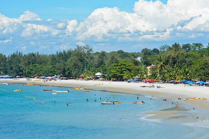 Port Dickson Beach Day Tour with Sunset Cruise - Walks toward Cape Rachado Lighthouse, if you want extra scenery