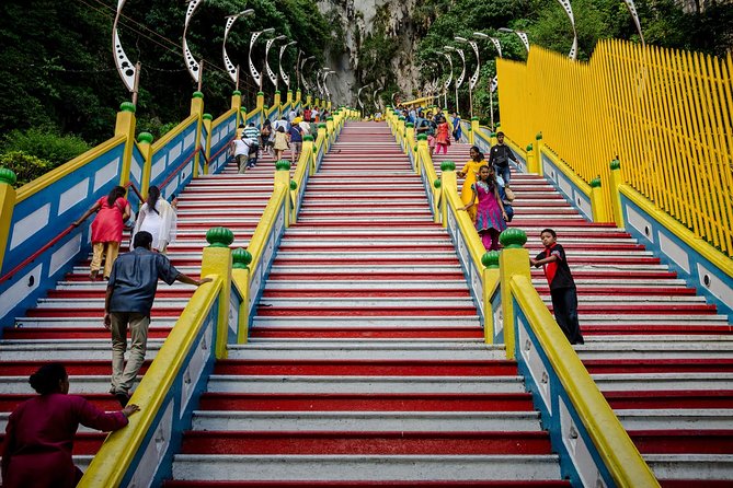 Private Half-Day Kuala Lumpur Culture And Communities Exploration Tour - Batu Caves: Hindu shrines, limestone views, and that climb energy