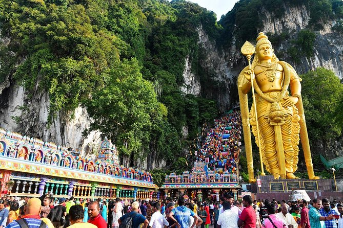Private Tour Kuala Lumpur with Petronas Twin Towers Observation Deck & Batu Cave - Batu Caves: 272 steps, temple statues, and the day’s first big wow