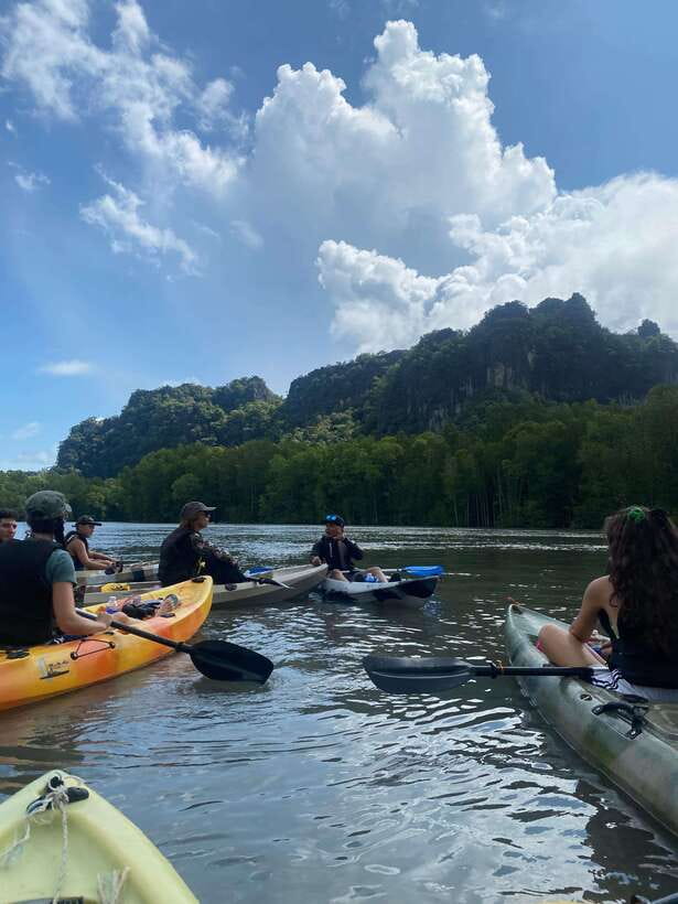 Small Group, Big Heart: Kilim Karst Mangrove Kayak Adventure - The short speedboat hop and the floating hub setup